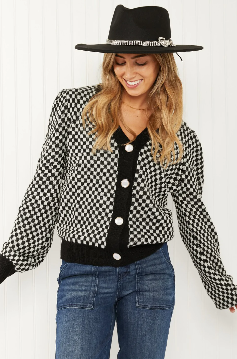 WJ Look the Part Large check puff shoulder cardigan.